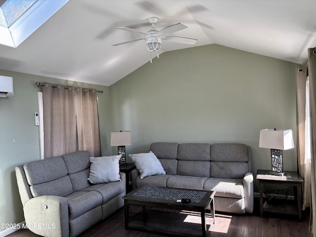 living area featuring dark wood-style floors, ceiling fan, and vaulted ceiling with skylight