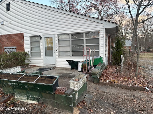 rear view of property with a patio area