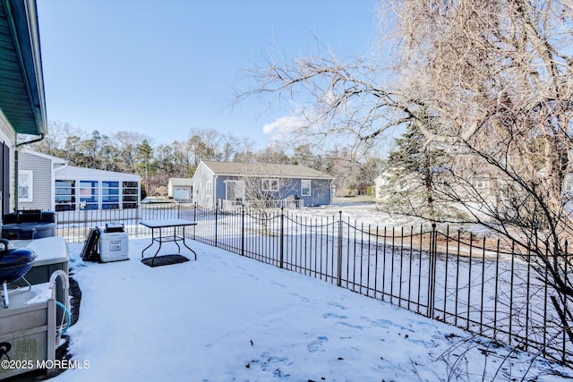 view of yard covered in snow