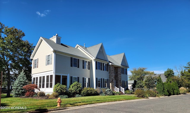 exterior space with a lawn