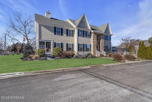 view of front of house with a front yard