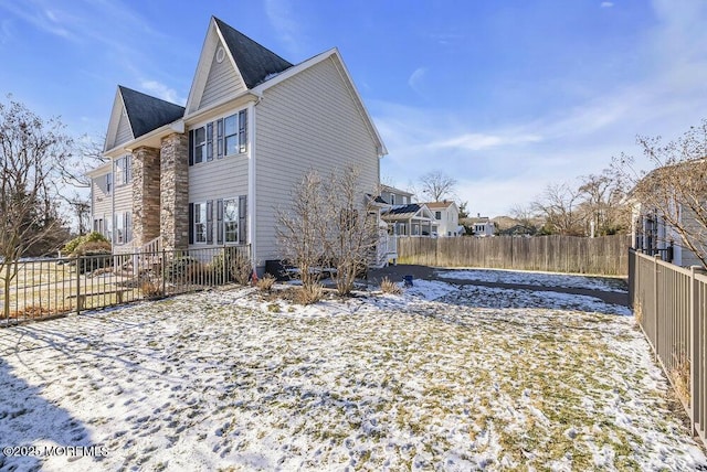 view of snow covered property