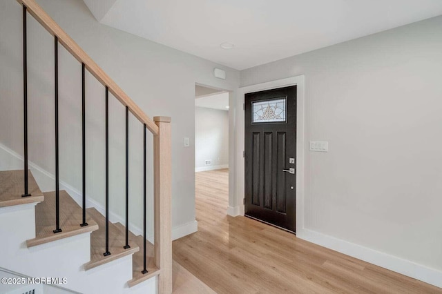 entrance foyer with light hardwood / wood-style floors