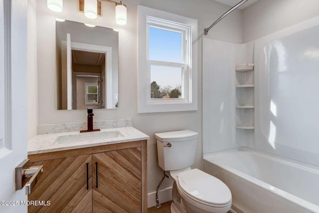 full bathroom featuring vanity, toilet, and bathtub / shower combination