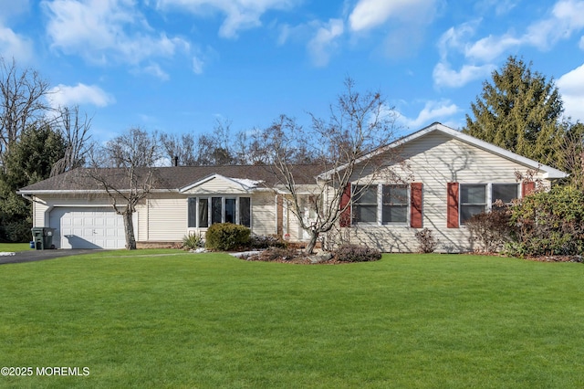 single story home with a front yard and a garage