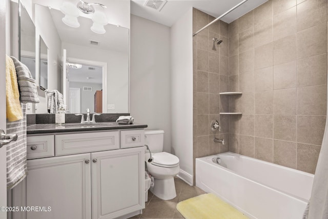 full bathroom with tile patterned flooring, vanity, shower / tub combo, and toilet