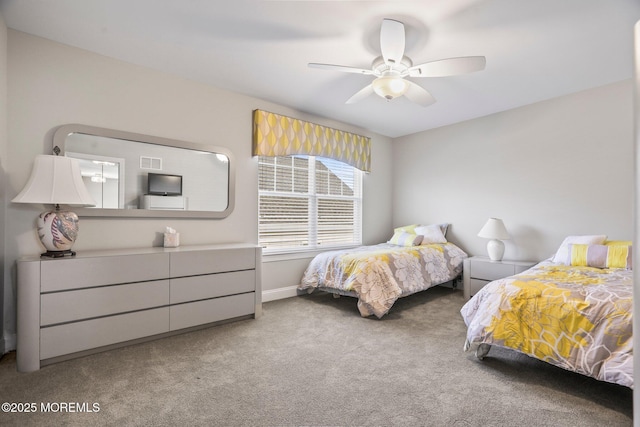 bedroom with light carpet and ceiling fan