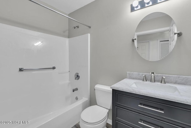 full bathroom with vanity, shower / washtub combination, and toilet