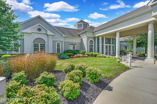 exterior space featuring a front lawn