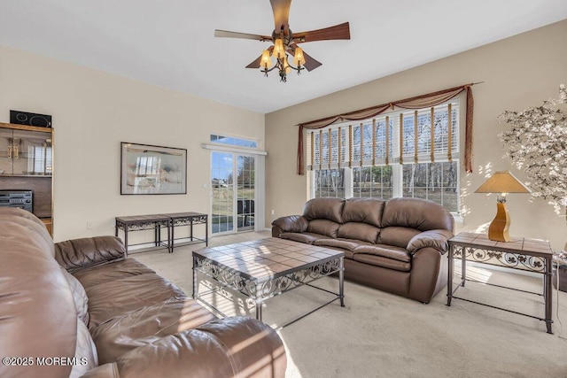 carpeted living room featuring ceiling fan