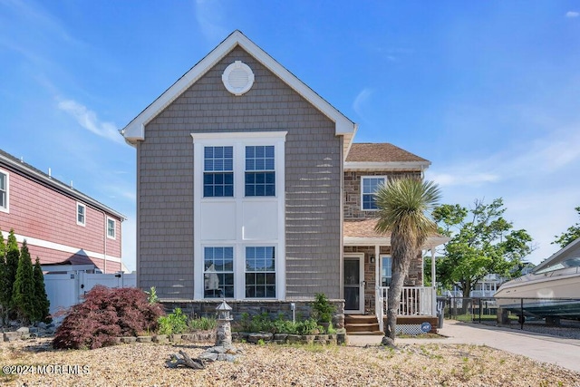 view of front of property featuring covered porch