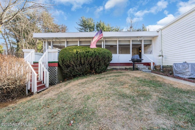 exterior space featuring a yard