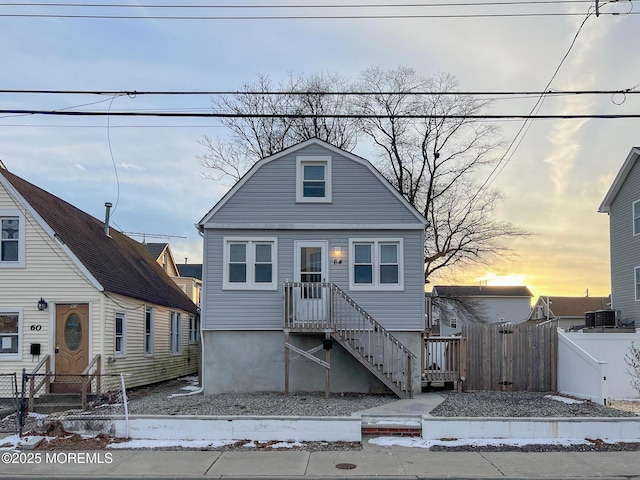 view of front of house with cooling unit