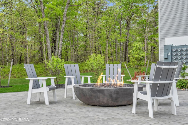 view of patio / terrace with an outdoor fire pit