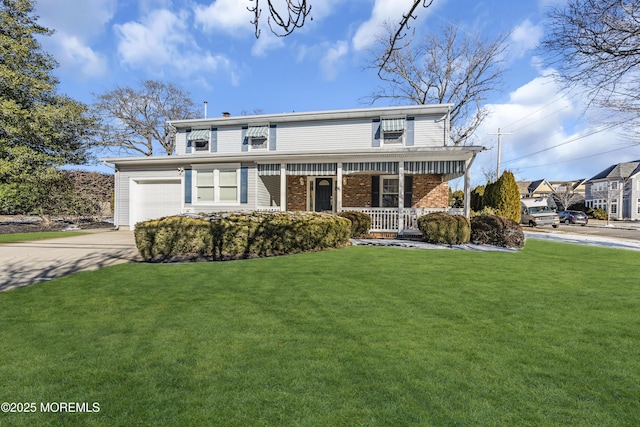 front facade featuring a porch, a garage, and a front lawn