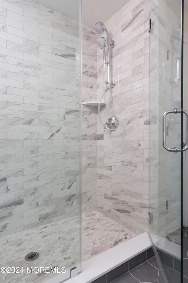 bathroom with an enclosed shower