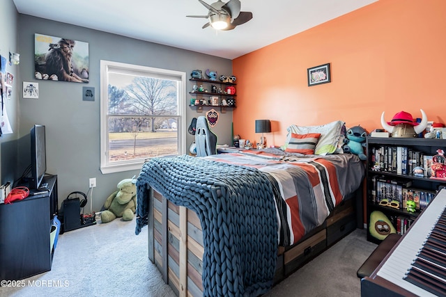 carpeted bedroom with ceiling fan