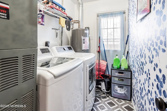 laundry area with separate washer and dryer and electric water heater