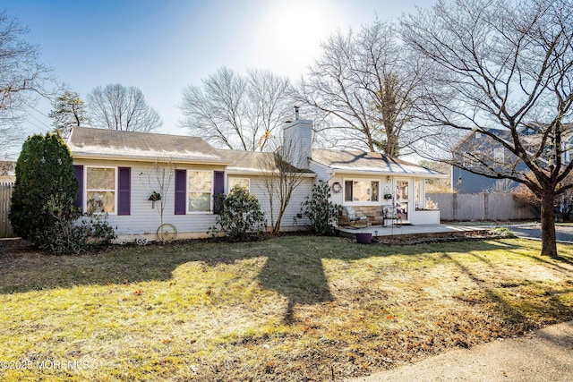 single story home with a patio and a front yard