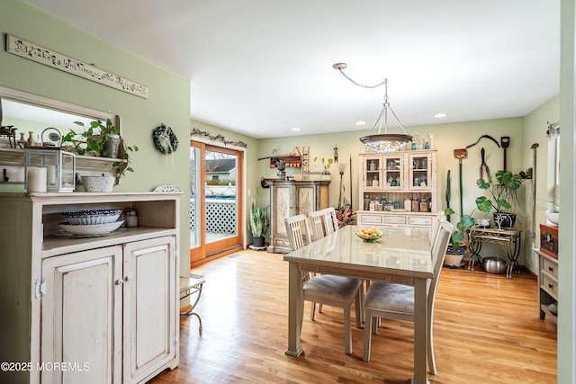 dining room featuring light hardwood / wood-style floors