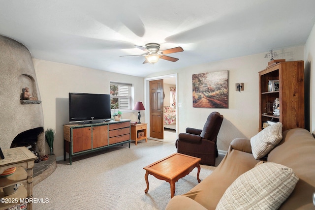 living room featuring ceiling fan