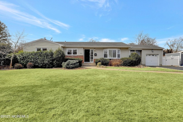 single story home featuring brick siding, an attached garage, and a front lawn