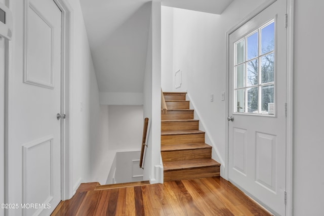 stairway with wood-type flooring