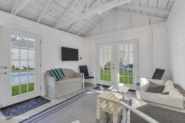 sunroom / solarium with french doors, wooden ceiling, and lofted ceiling with beams