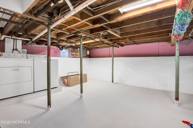 basement featuring separate washer and dryer