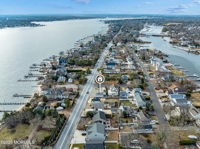 drone / aerial view featuring a water view