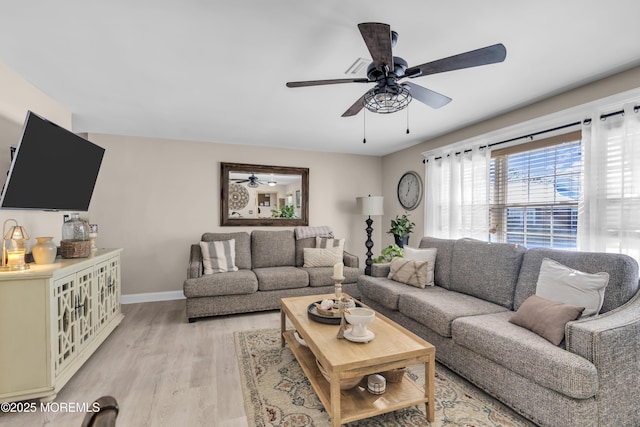 living room with light hardwood / wood-style floors