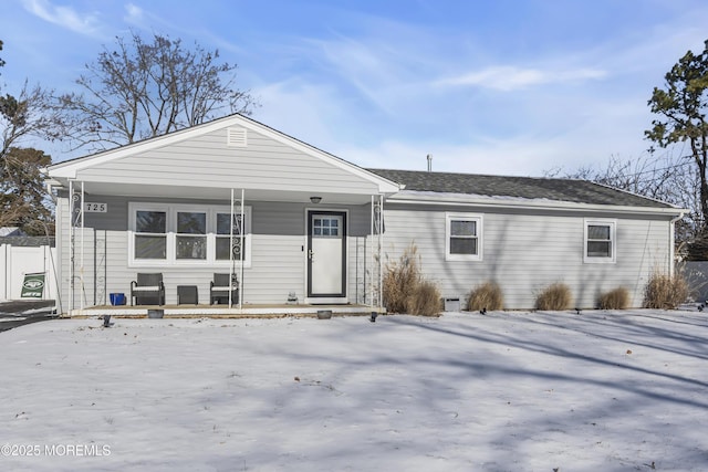 ranch-style home with a porch