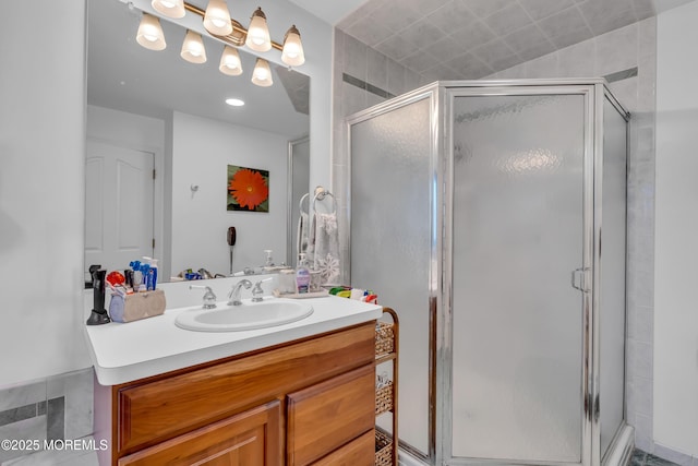 bathroom featuring vanity and walk in shower