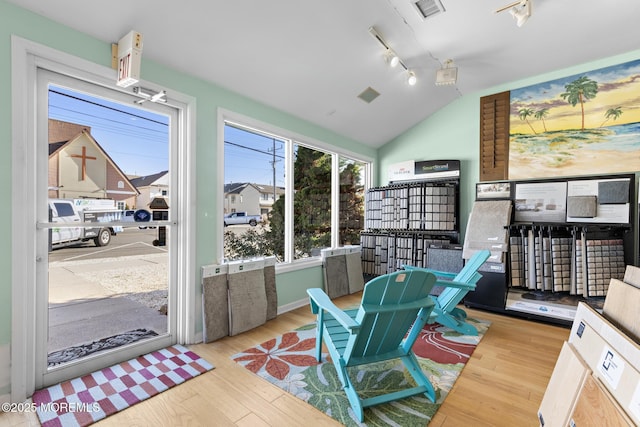 sunroom / solarium with lofted ceiling