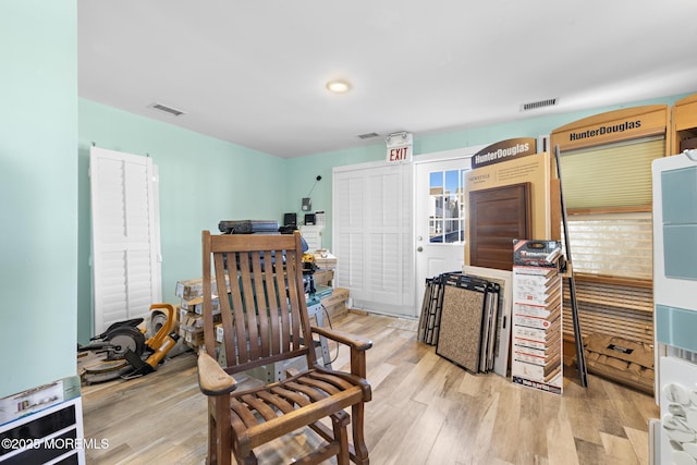 bedroom with light hardwood / wood-style floors