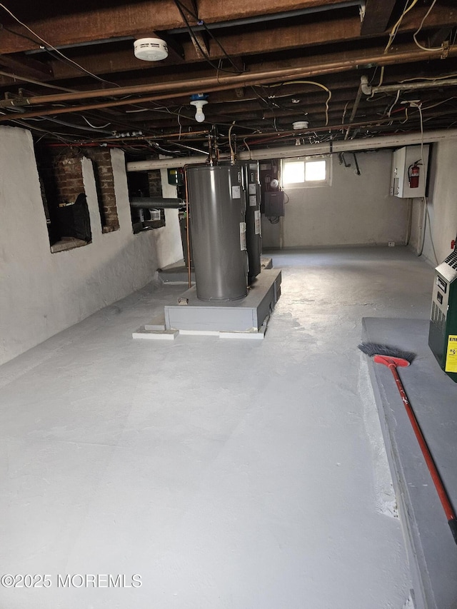 basement featuring gas water heater