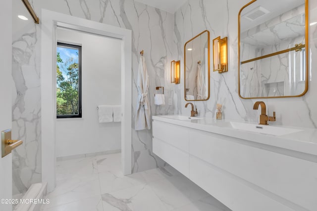 bathroom with vanity and an enclosed shower