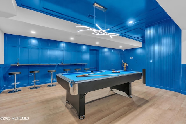 playroom with pool table and light hardwood / wood-style flooring