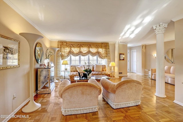 living room featuring crown molding, parquet flooring, and decorative columns