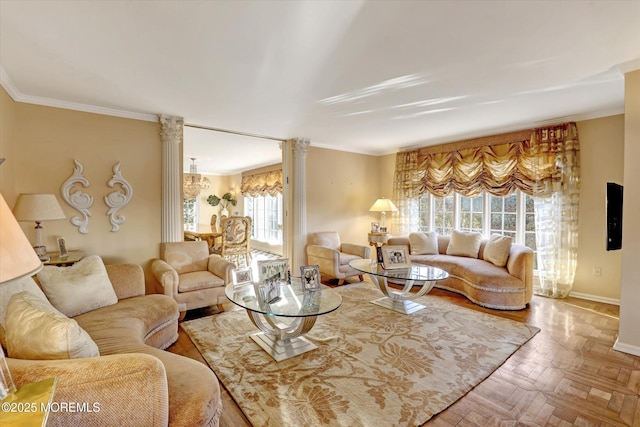 living room featuring crown molding, parquet flooring, and ornate columns