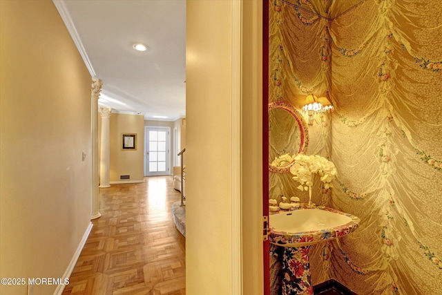 corridor featuring crown molding and parquet flooring