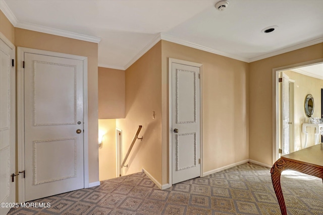 interior space with crown molding and carpet