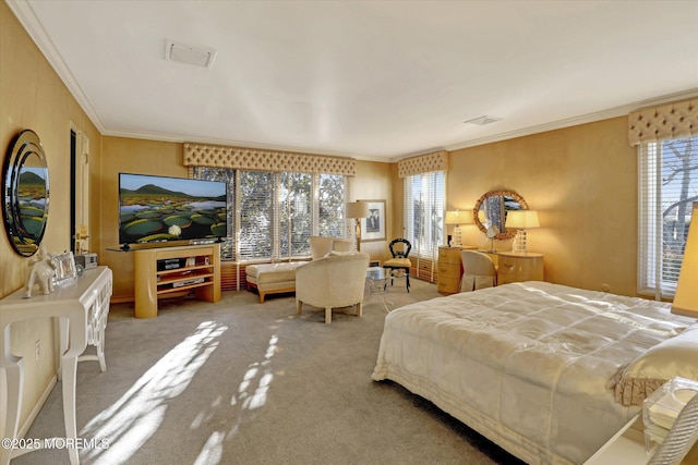 bedroom with crown molding and carpet