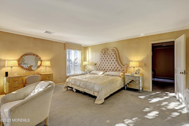 bedroom featuring ornamental molding and carpet