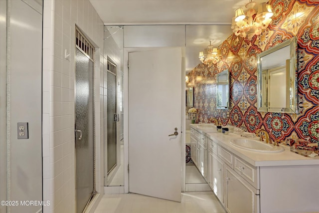 bathroom with tile patterned floors and vanity