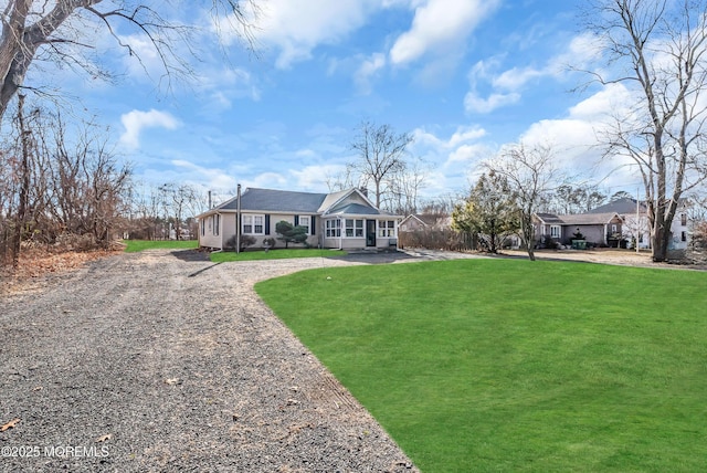 ranch-style house with a front yard