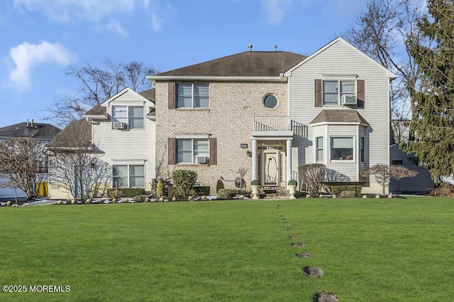 view of front of property with a front lawn