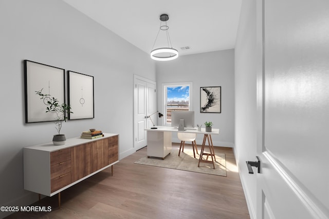 23A Stoney Hill Rd, Cream Ridge, NJ 08514 - home office featuring light wood-type flooring, baseboards, and visible vents