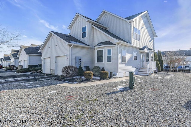 view of home's exterior featuring a garage