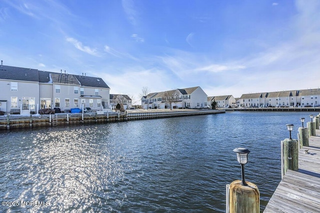 view of dock with a water view